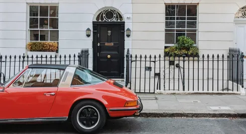 A classic Porsche is seen on a side street in London
