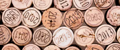 masthead stacking of wine cork background with vintage years v2