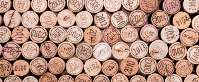masthead stacking of wine cork background with vintage years